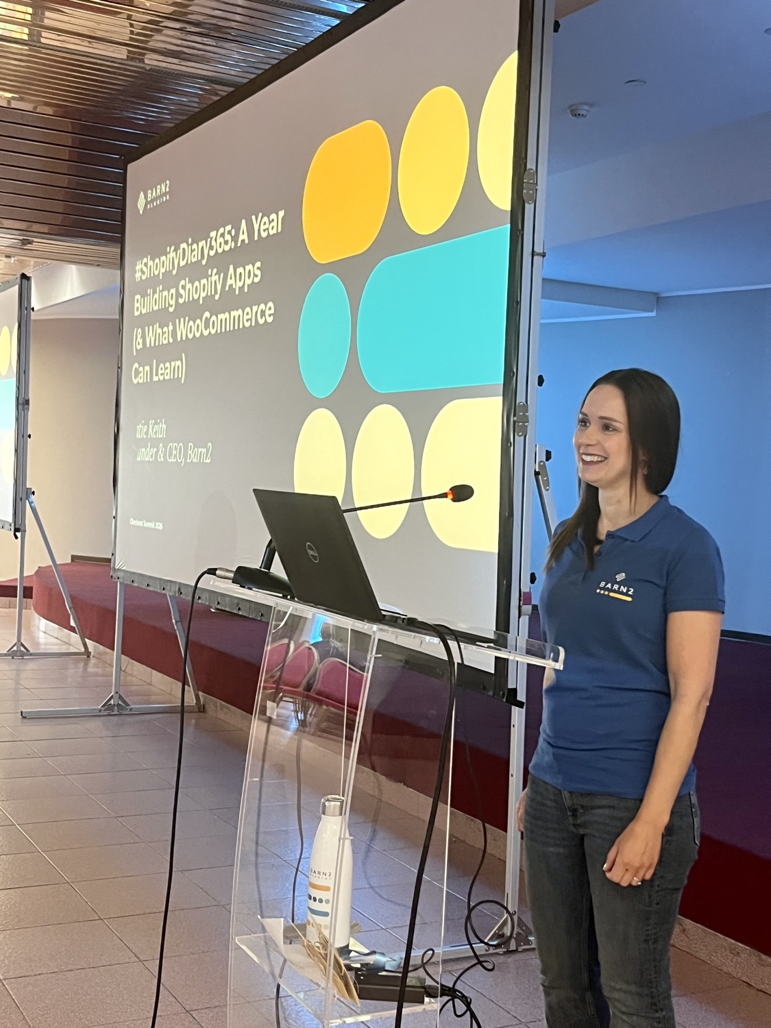 Katie Keith, Founder and CEO of Barn2, presenting a talk on building Shopify apps